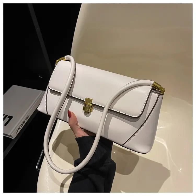 Black Leather Shoulder Bag with Gold Plated Latches — feature 51