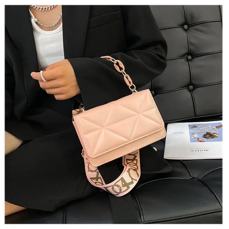 Black Quilted Crossbody Bag with Gold Chain Strap — feature 13