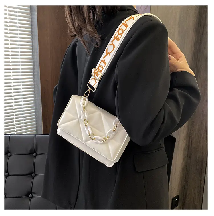Black Quilted Crossbody Bag with Gold Chain Strap — feature 14
