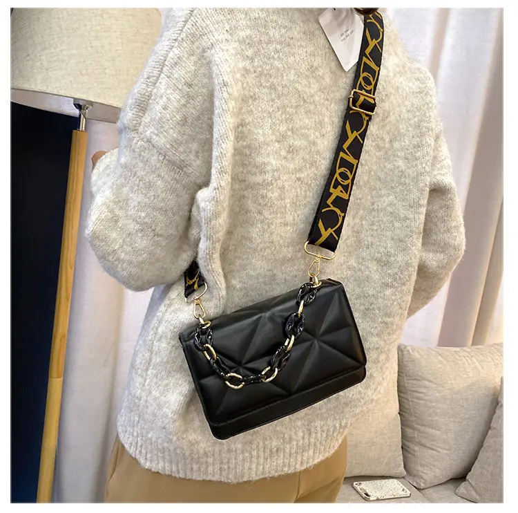 Black Quilted Crossbody Bag with Gold Chain Strap — feature 17