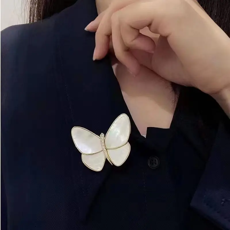 Pearl-Enriched Butterfly Brooch with Diamond Details — feature 1