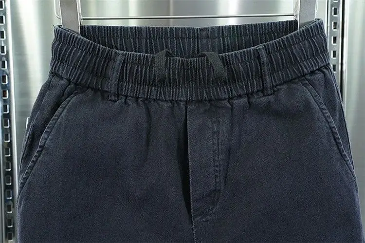 Men Black Slim Fit Cropped Harem Pants with Embroidered Stitching — feature 6