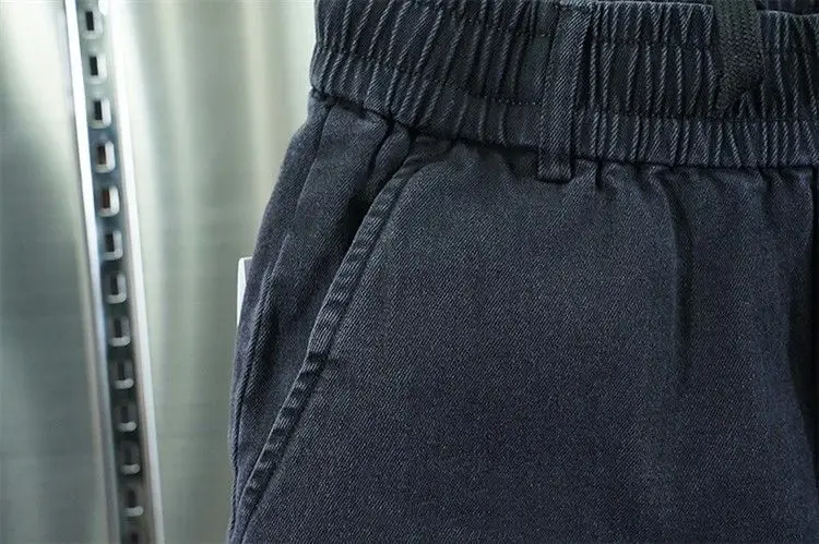 Men Black Slim Fit Cropped Harem Pants with Embroidered Stitching — feature 8