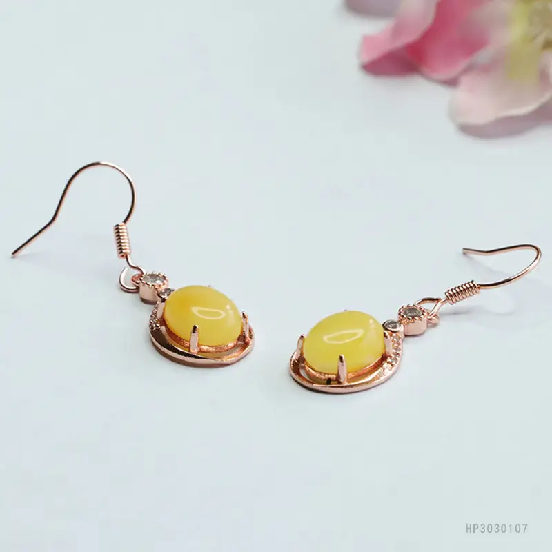 Guan Yu Yellow Amber Earrings with Honey Design — feature 11