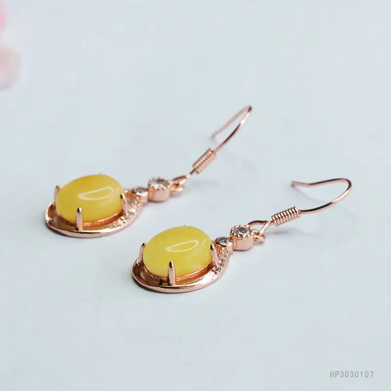 Guan Yu Yellow Amber Earrings with Honey Design — feature 9