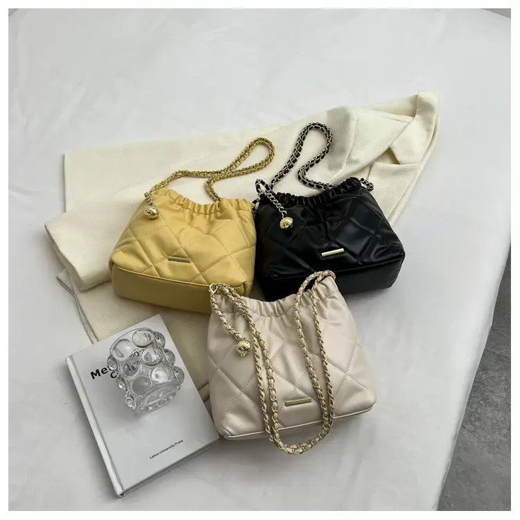 Black Quilted Shoulder Bag with Gold Chain Strap — feature 9