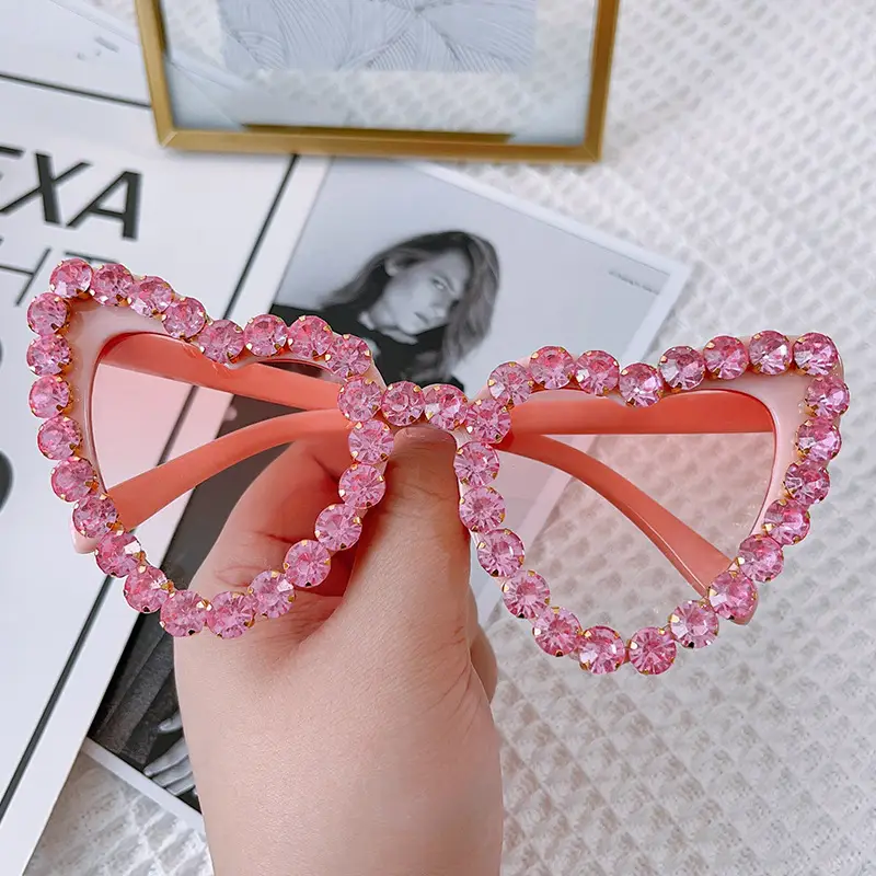 Red Heart-Shaped Sunglasses for Women with Crystal Embellishment