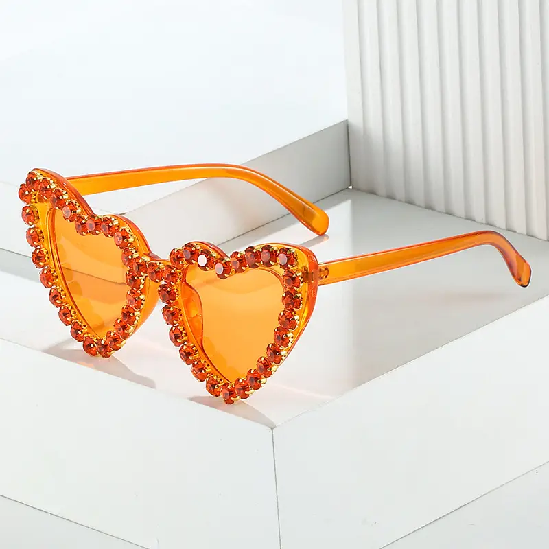 Red Heart-Shaped Sunglasses for Women with Crystal Embellishment