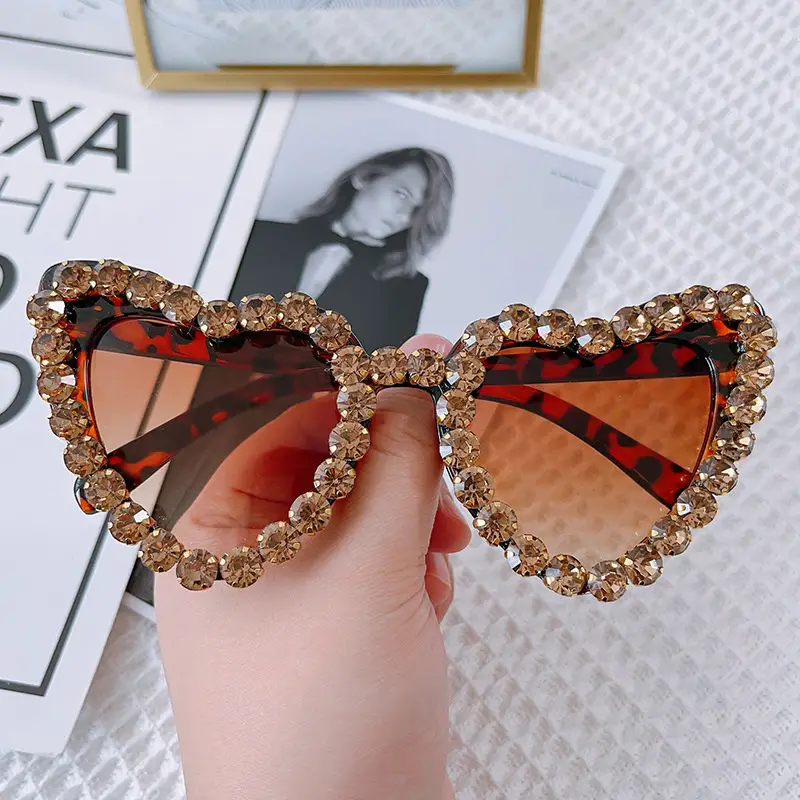 Red Heart-Shaped Sunglasses for Women with Crystal Embellishment