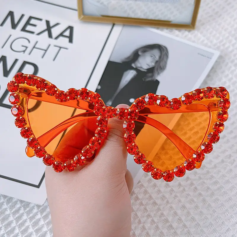 Red Heart-Shaped Sunglasses for Women with Crystal Embellishment
