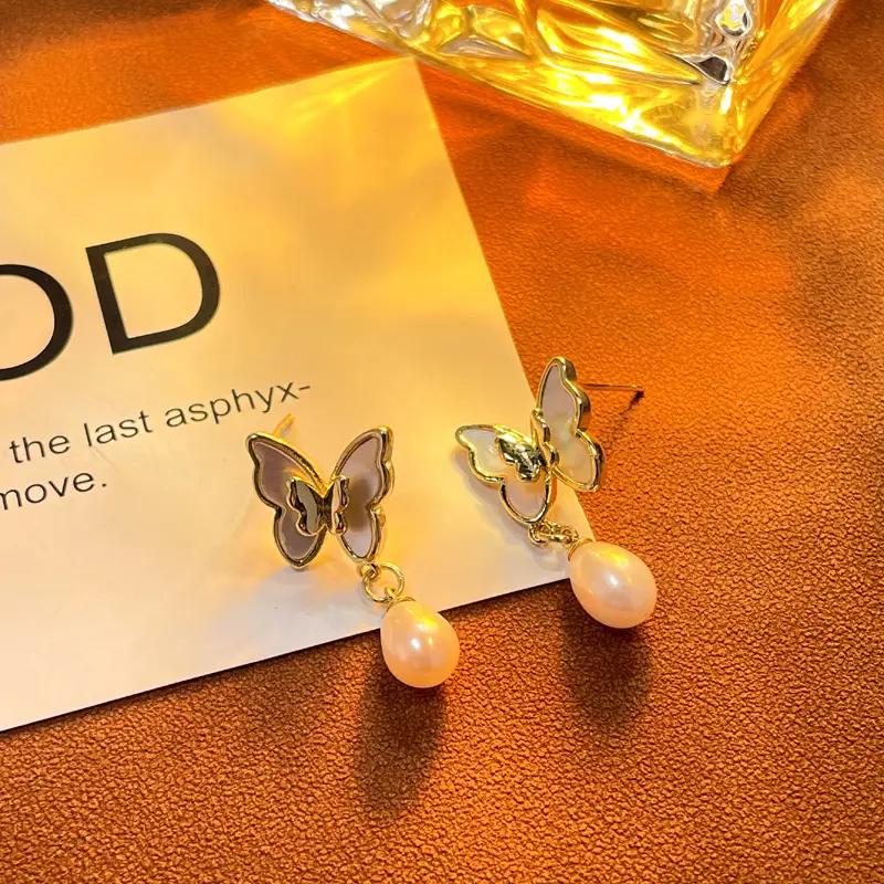 White Butterfly Pearl Earrings for Women - Image 3
