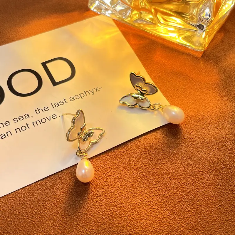 White Butterfly Pearl Earrings for Women - Image 4