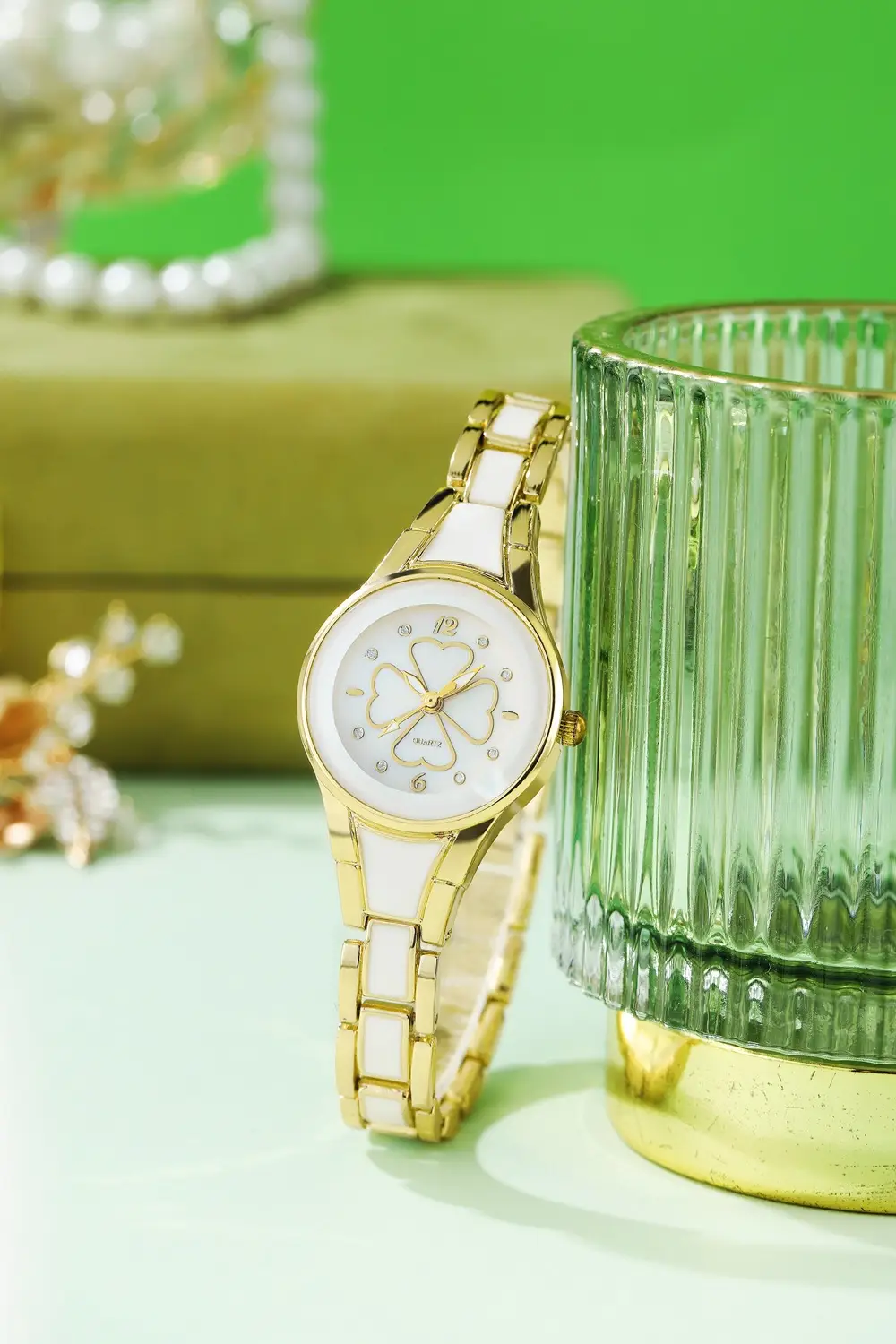 Women's Gold Butterfly Dial Watch with Diamond Bracelet — feature 4