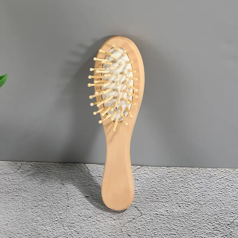 Medium oval wood comb: 16*4.5cm (bulk)