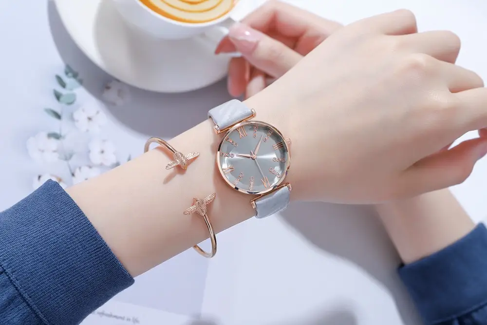 Women's Rose Gold Roman Dial Watch with Beige Strap — feature 10