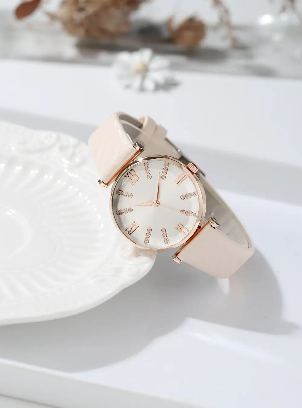 Women's Rose Gold Roman Dial Watch with Beige Strap — feature 3