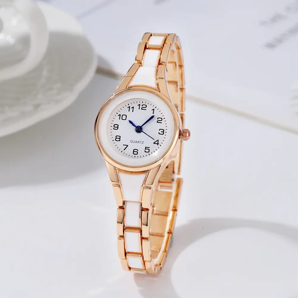 Gold Analog Women's Watch with Classic Dial & Bracelet - Image 8