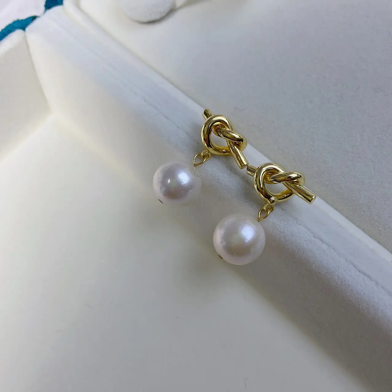 Artificial Pearl Earrings with Knoted Metal Design - Image 3