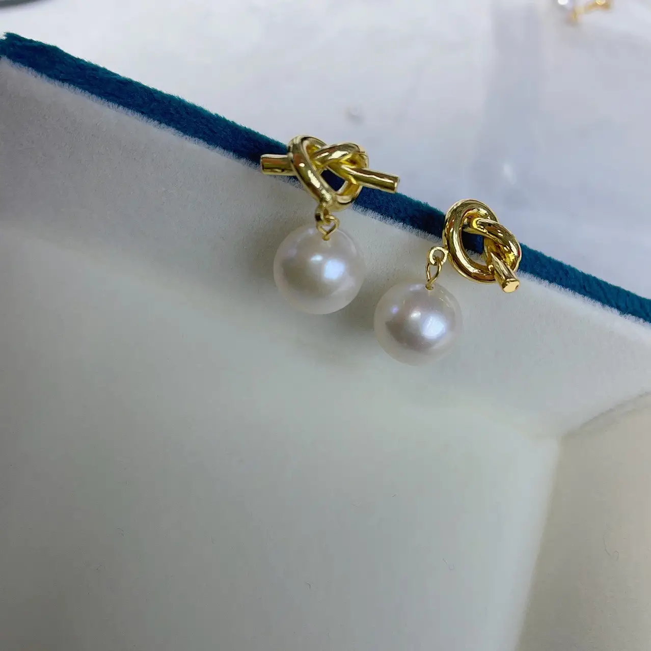 Artificial Pearl Earrings with Knoted Metal Design - Image 5