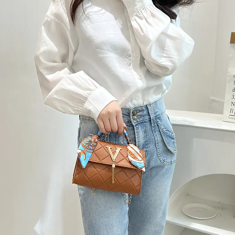 Embossed Silk Scarf Bag with Tassel Lock Chain - Image 7