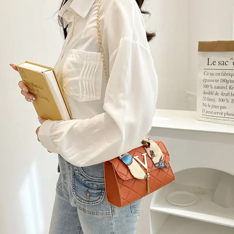 Embossed Silk Scarf Bag with Tassel Lock Chain - Image 8