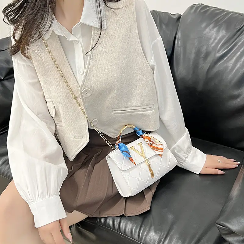 Embossed Silk Scarf Bag with Tassel Lock Chain - Image 9