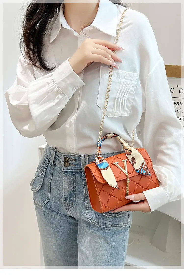 Embossed Silk Scarf Bag with Tassel Lock Chain — feature 1