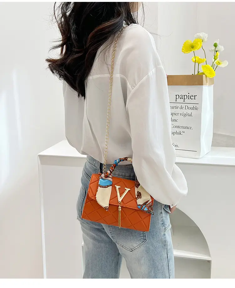 Embossed Silk Scarf Bag with Tassel Lock Chain — feature 11