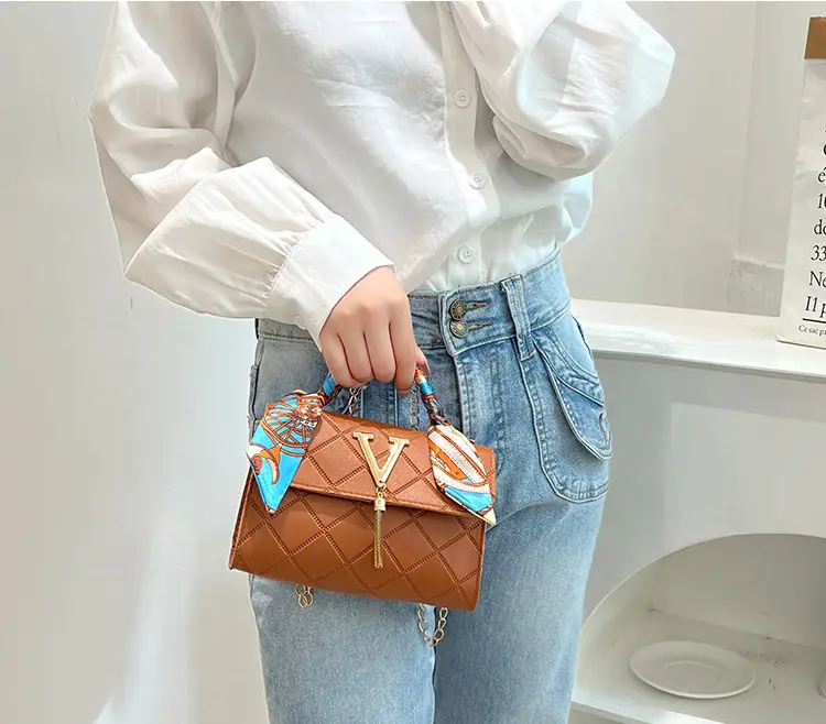 Embossed Silk Scarf Bag with Tassel Lock Chain — feature 15