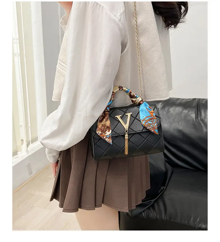 Embossed Silk Scarf Bag with Tassel Lock Chain — feature 17
