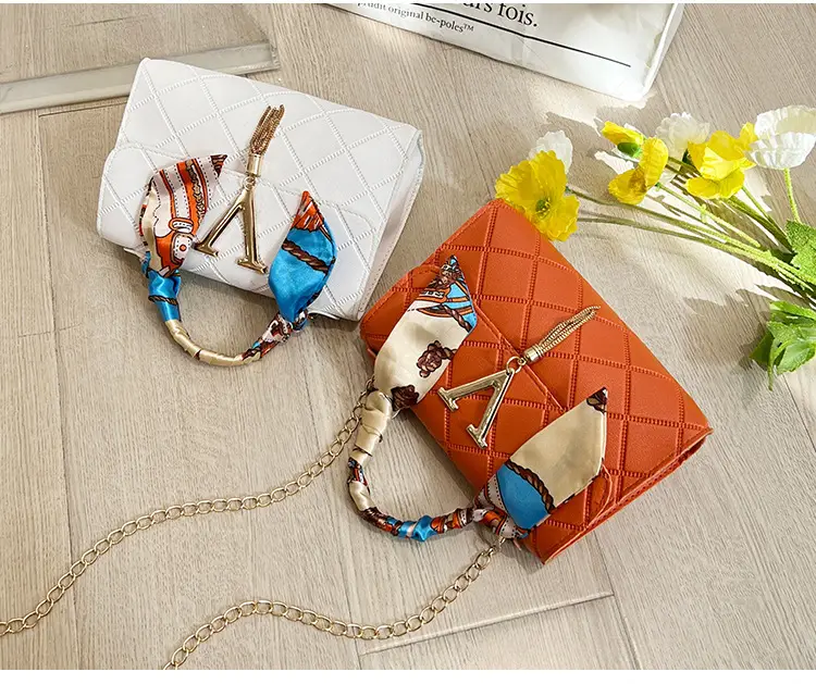 Embossed Silk Scarf Bag with Tassel Lock Chain — feature 20