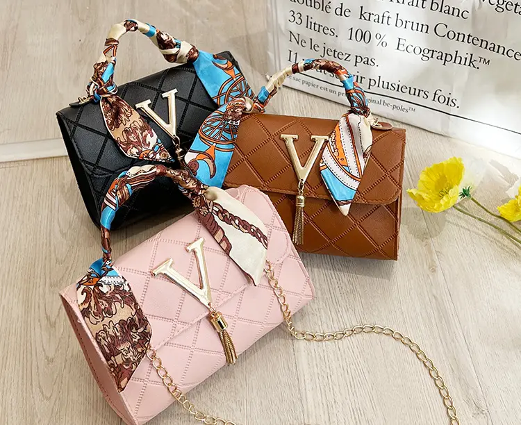 Embossed Silk Scarf Bag with Tassel Lock Chain — feature 21