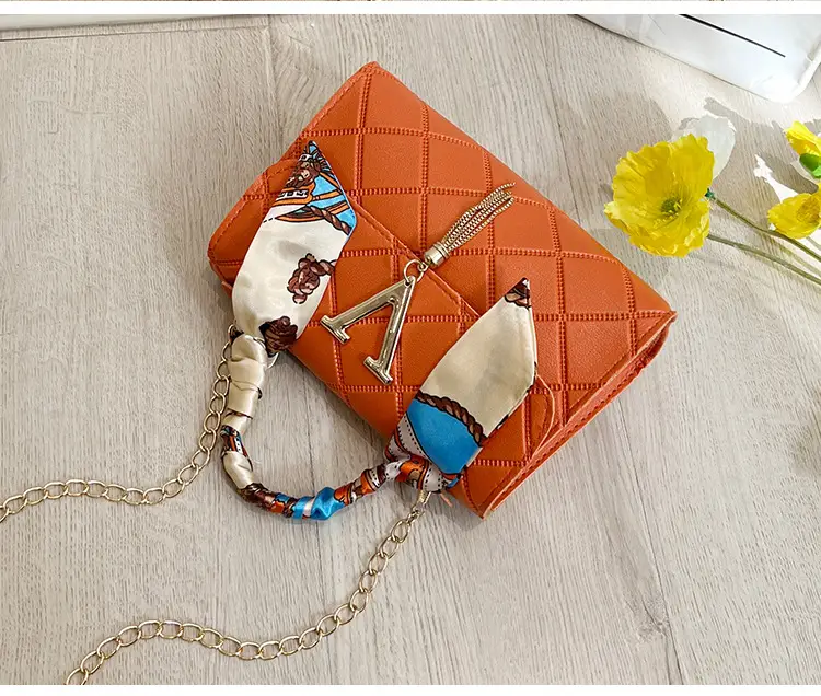 Embossed Silk Scarf Bag with Tassel Lock Chain — feature 22