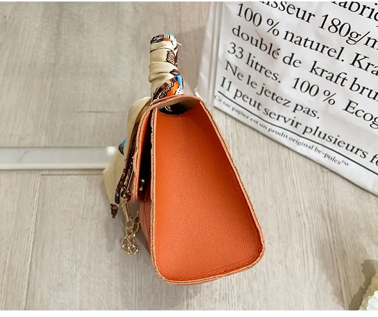 Embossed Silk Scarf Bag with Tassel Lock Chain — feature 23