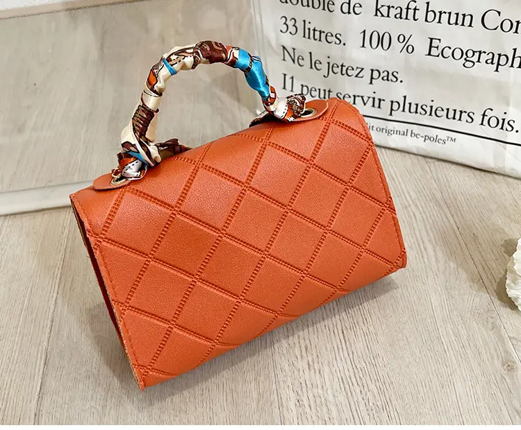Embossed Silk Scarf Bag with Tassel Lock Chain — feature 24