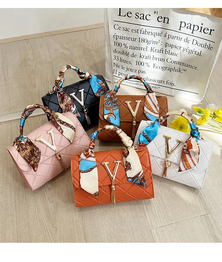 Embossed Silk Scarf Bag with Tassel Lock Chain — feature 3