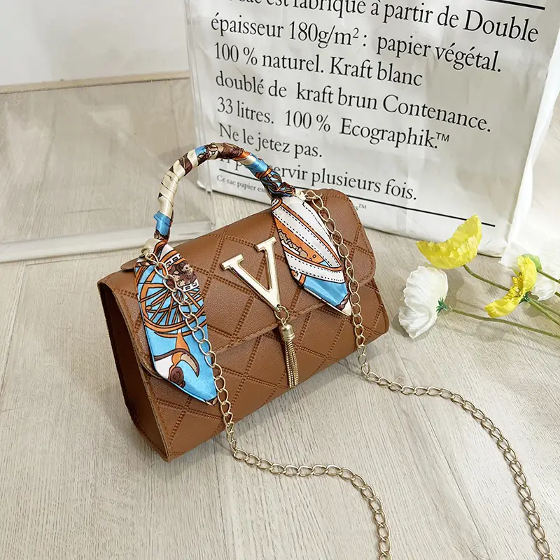 Embossed Silk Scarf Bag with Tassel Lock Chain - Image 4