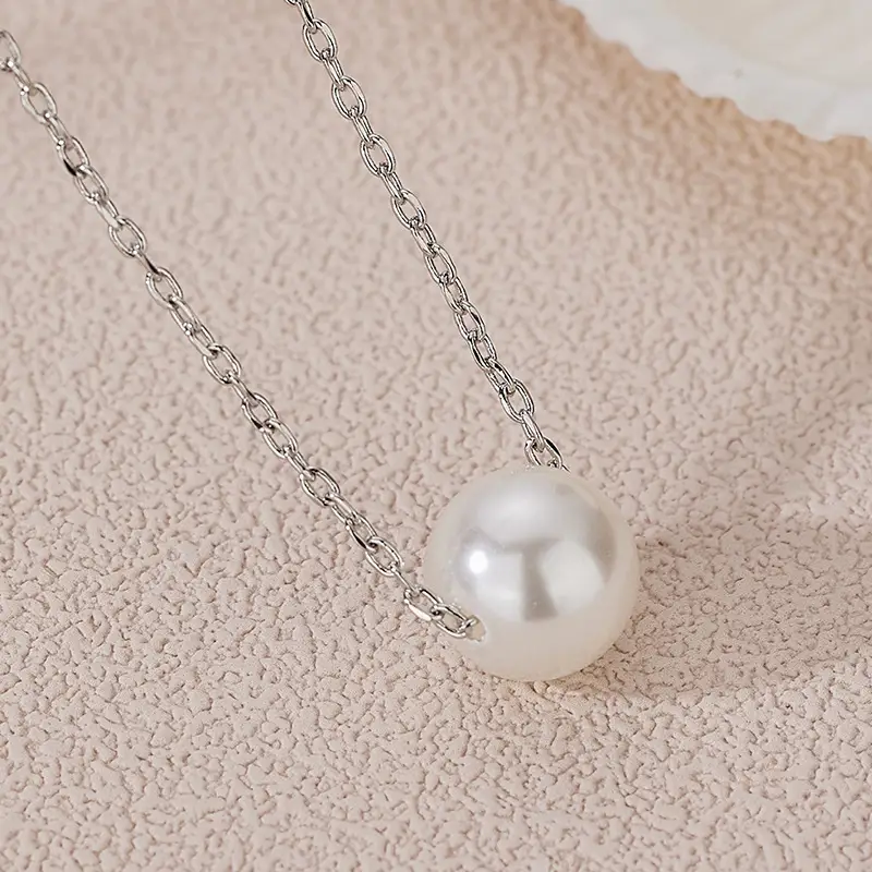 French Retro Pearl & Shell Cross Chain Necklace - Image 4