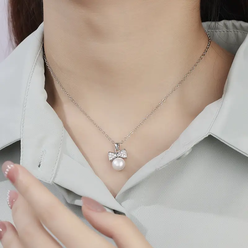 Women's Pearl Bow Pendant Necklace with Zircon Accents