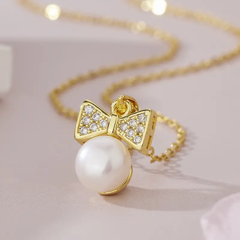Women's Pearl Bow Pendant Necklace with Zircon Accents