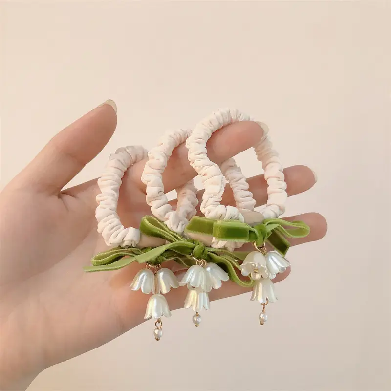 Lily Orchid Hair Rope with Green Bow & Pearl Drop - Image 3