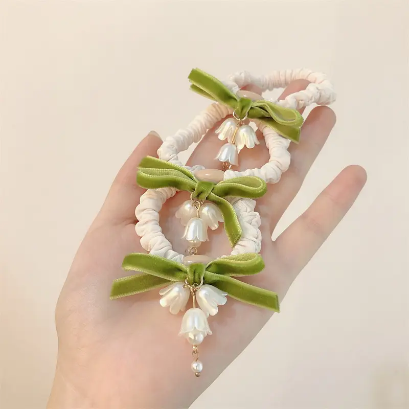 Lily Orchid Hair Rope with Green Bow & Pearl Drop - Image 4