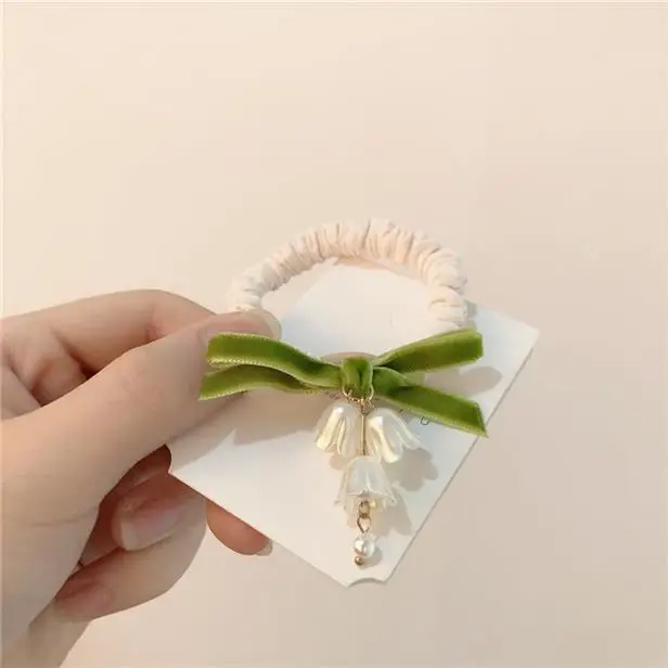 Lily Orchid Hair Rope with Green Bow & Pearl Drop — feature 2