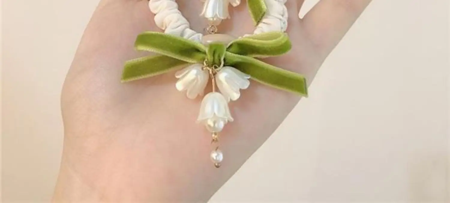 Lily Orchid Hair Rope with Green Bow & Pearl Drop — feature 4