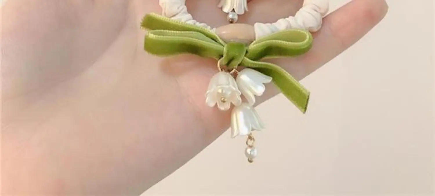 Lily Orchid Hair Rope with Green Bow & Pearl Drop — feature 7