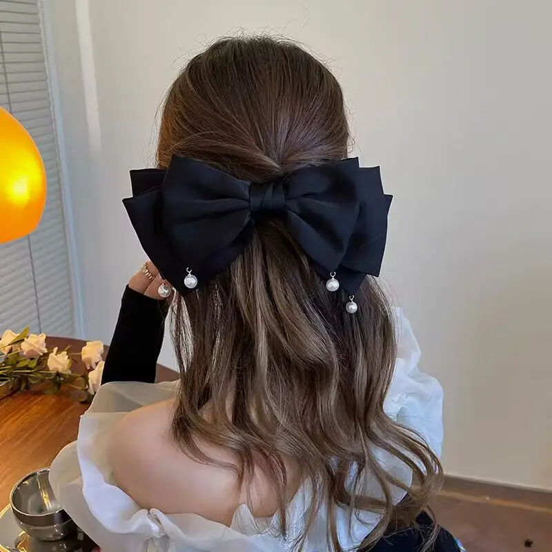 Elegant Satin Bow Hairpin with Pearl Accents — feature 1