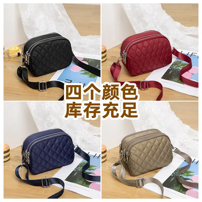 Black Rhombus Crossbody Bag with Patterned Strap