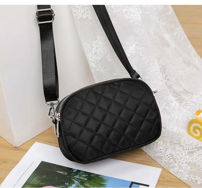 Black Rhombus Crossbody Bag with Patterned Strap — feature 15