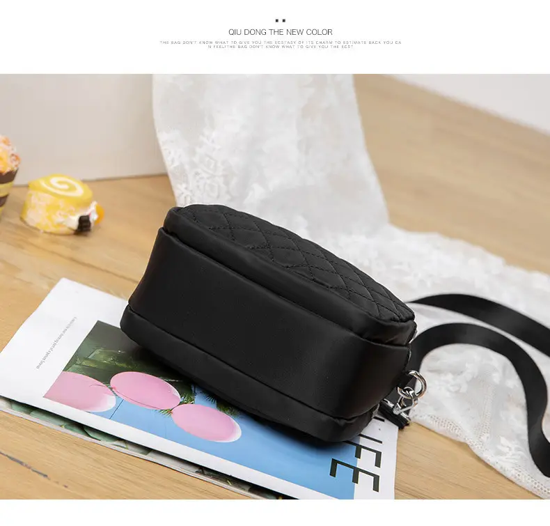 Black Rhombus Crossbody Bag with Patterned Strap — feature 18