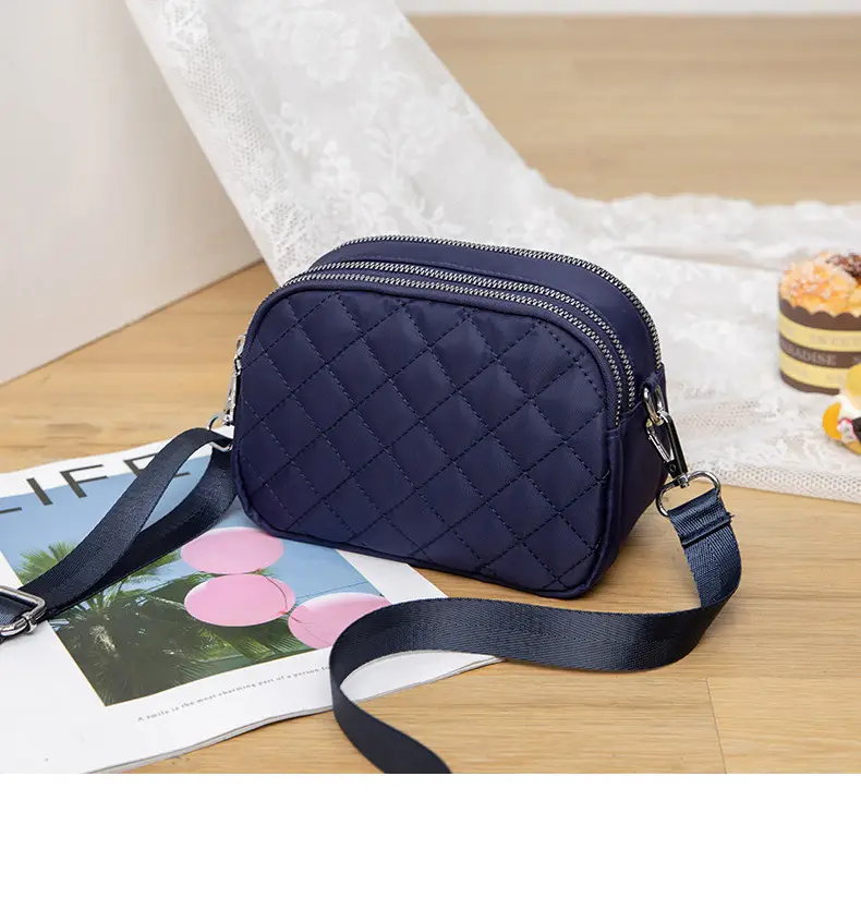 Black Rhombus Crossbody Bag with Patterned Strap — feature 21